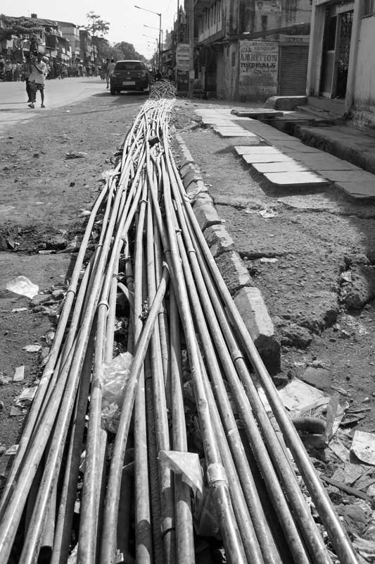 Pipes leading to group water connections in informal settlements in Mumbai, Maharashtra